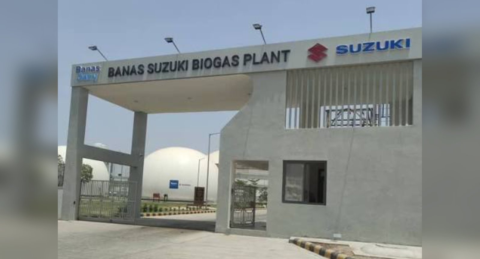 Entrance of the Banas Suzuki Biogas Plant featuring the Banas and Suzuki signboards.